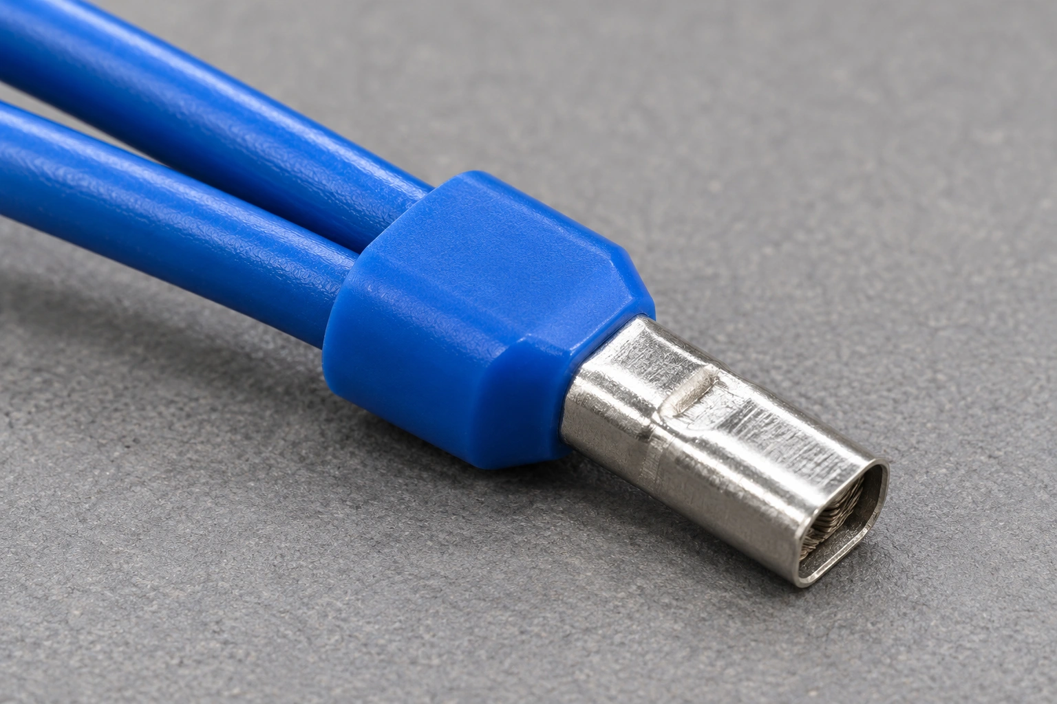 Illustrative two-wire termination with a shared twin ferrule sleeve