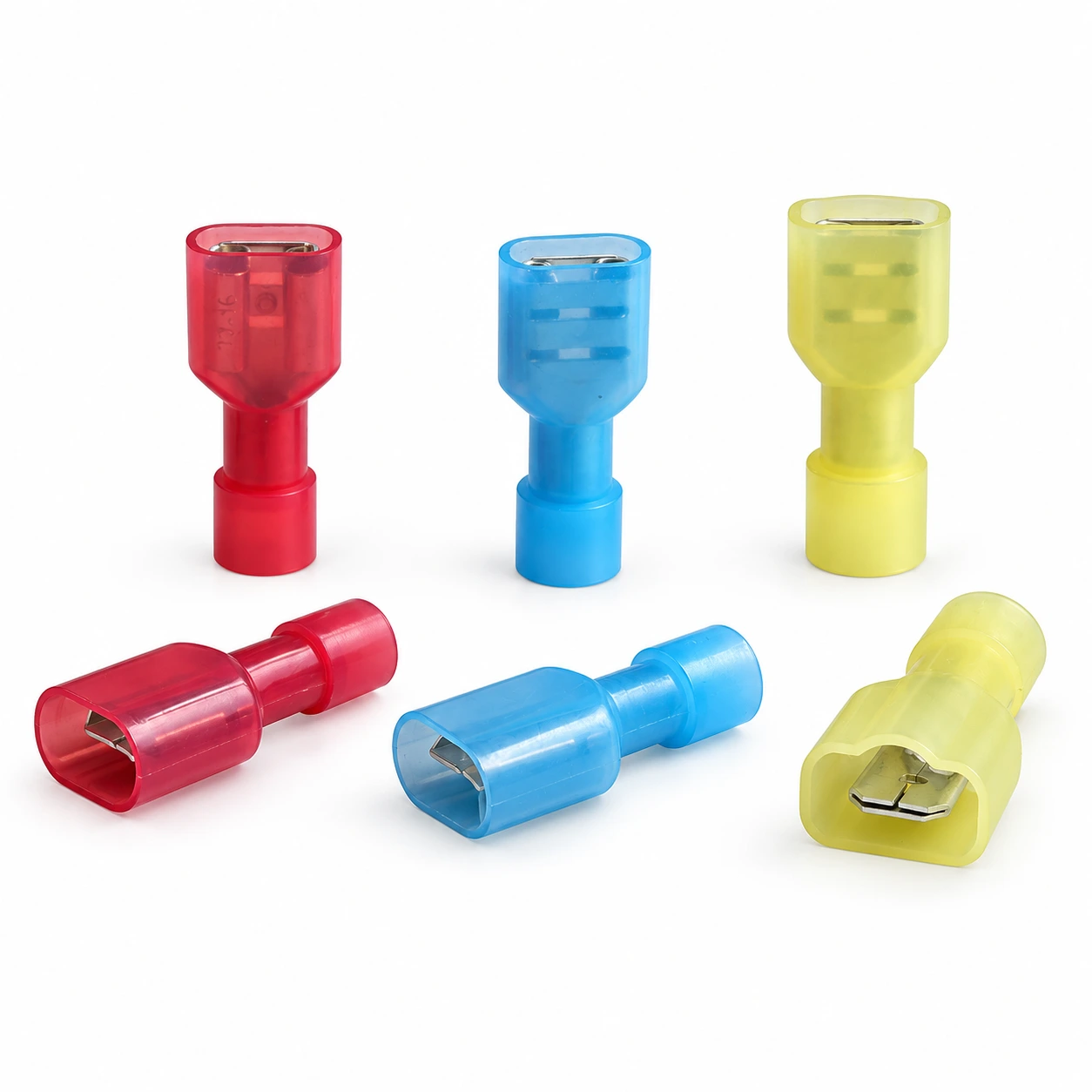 Six red, blue and yellow fully insulated nylon female disconnect terminals in upright and lying orientations, illustrative recreation of the original TONFUL catalogue photograph